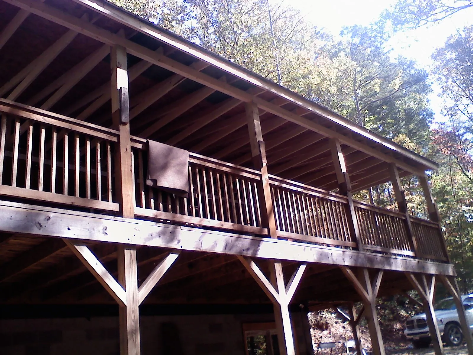 Timber framing under a new elevated porch and deck — Roof Leak Repair in Brookhaven by Roofing Brothers